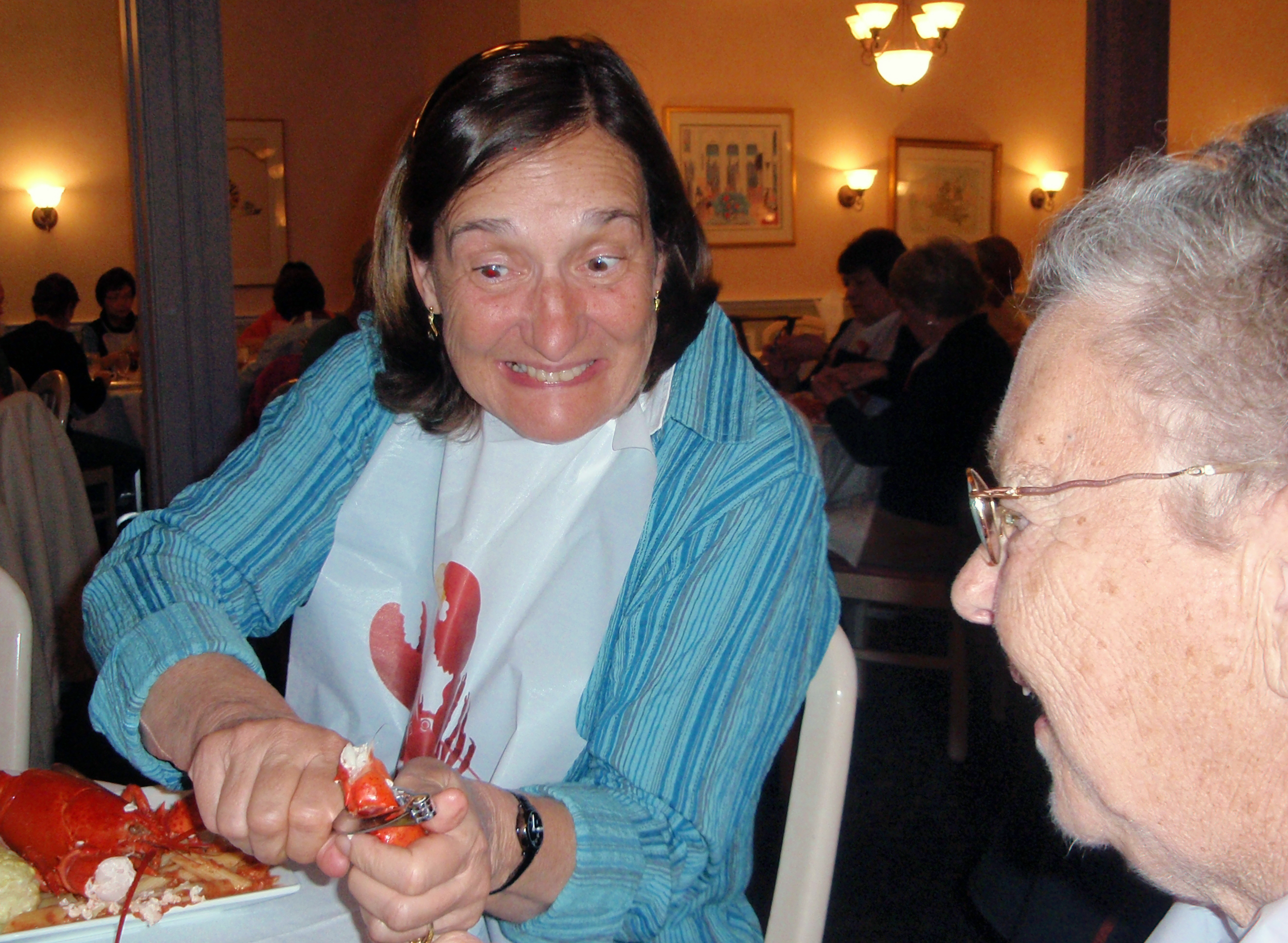 Photo of Judy eating lobster in Vermont in 2009